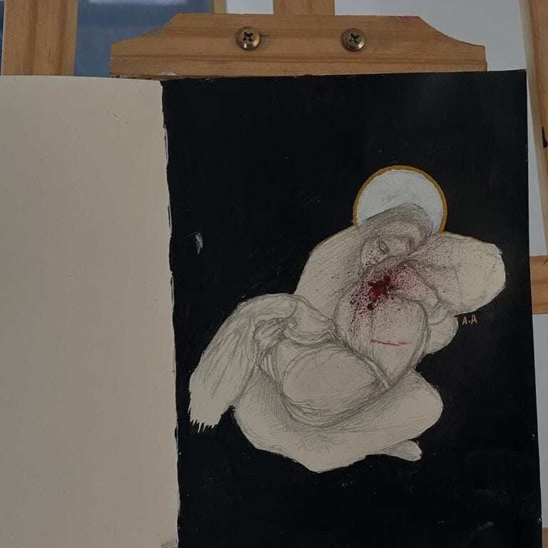 A woman holding a blood stained child.