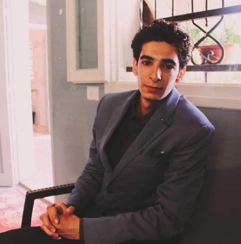 Photo of Adel Ramady in a Suit.