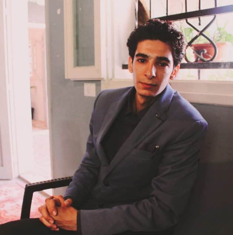 Photo of Adel Ramady in a Suit.