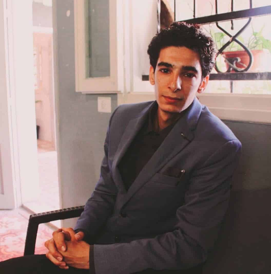 Photo of Adel Ramady in a Suit.