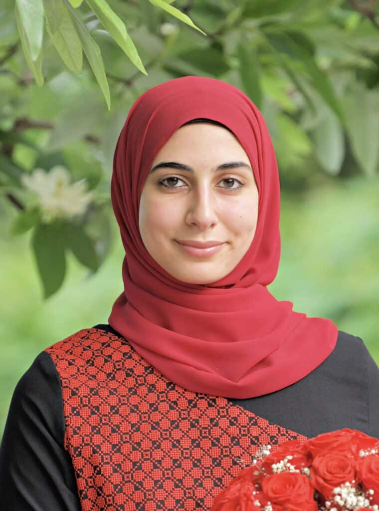 Jenna Jabr in red hijab