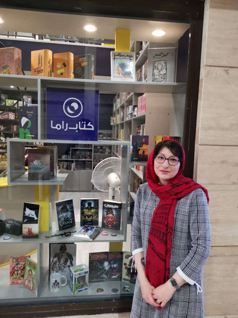 Zoha Kazemi in front of her book store